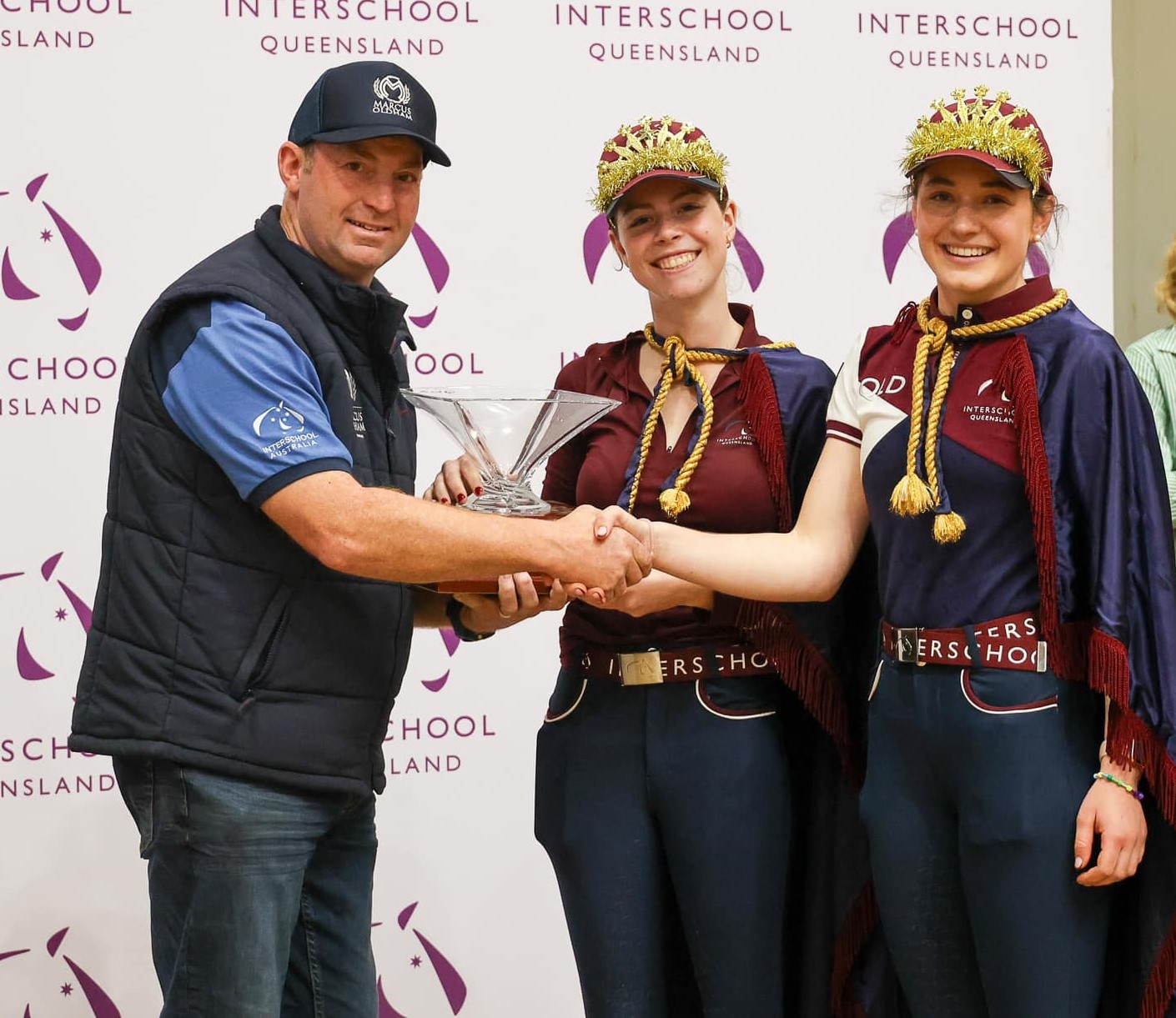 James Lang from Marcus Oldham presenting the Harry Le Bherz trophy to Queensland Team Captains